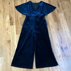 Anthropologie teal velvet jumpsuit with flutter sleeves, wrap top size Medium